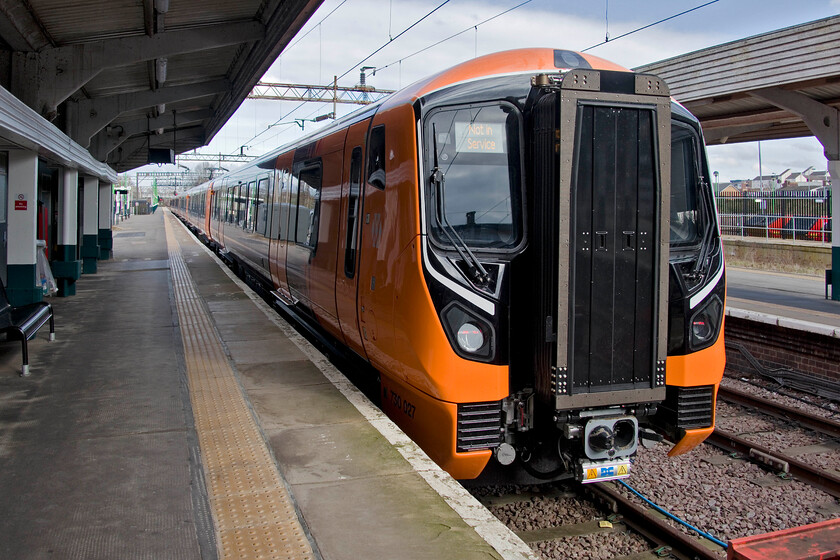 730027, 10.18 Northampton-Birmingham International (5Q53, RT), Northampton station 
 The orange trains have arrived at Northampton! Whilst not yet in service 730027 is awaiting to leave Northampton with the 5Q53 return driver training/familiarisation run to Birmingham International. With the first units now in operation between Watford and Euston they are to enter service in the West Midlands at any time. I am not too sure how many of these orange liveried trains will reach as far south as Northampton. 
 Keywords: 730027 10.18 Northampton-Birmingham International 5Q53 Northampton station.jpg