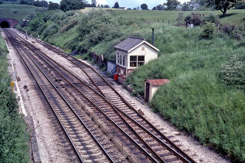 Whiteball Signal Box (BR, c.1958) 
 When I visited this spot last summer during my West of England cycle tour I wild camped very close to this spot just behind the signal box but failed to take a photograph of it. This box was constructed in 1958 by British Railways following the previous one being destroyed by fire. This is a very remote spot high up in the Blackdown Hills with the duty signalmen having a fairly long walk along the trackside to the minor road south of this location. Notice the refuge siding ending at the western portal of the tunnel and the one hundred and seventy-four milepost measured from Paddington via the Brunel route through Bath, Chippenham, Swindon and Didcot. 
 Keywords: Whiteball Signal Box