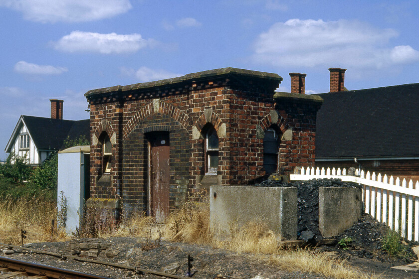 Former Bromfield station 
 The remains of Bromfield station are seen on the line between Hereford and Shrewsbury. The station closed to regular passengers in 1958 having been open for just over one hundred years. However, until 1965 it infrequently handled race traffic for the adjacent Ludlow racecourse. This remnant of the station building still stands very much the same as is seen here even down to the picket fencing. 
 Keywords: Former Bromfield station