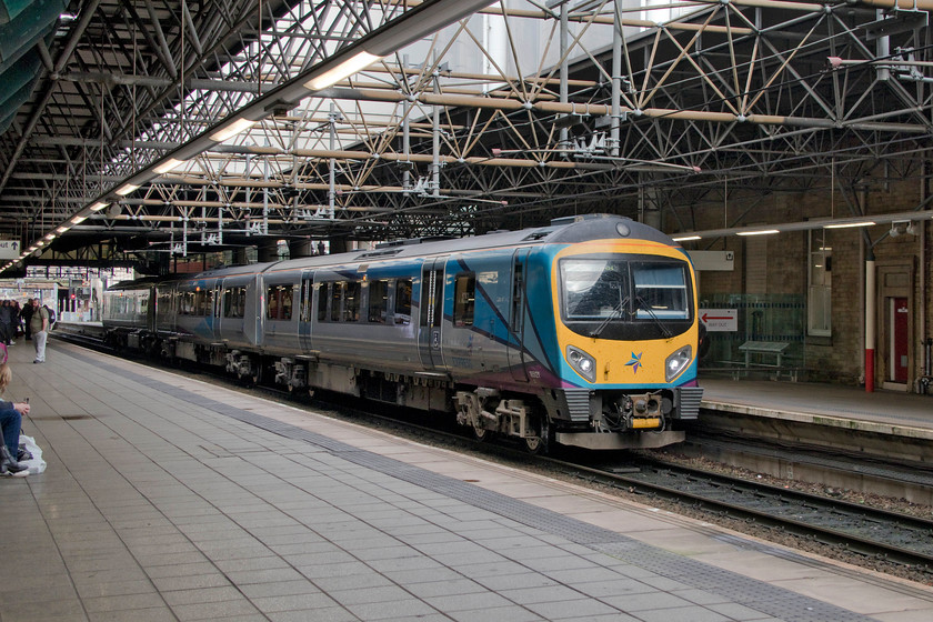 185121, TP 14.03 Newcastle-Liverpool Lime Street (9M12, 5L), Manchester Victoria station 
 TransPennine Express' 185121 pauses at Manchester Victoria station with the 14.03 Newcastle to Liverpool Lime Street. I visited Victoria station expecting and hoping to get my first sighting of one of TPE's new loco-hauled sets. Their introduction was to lead to the withdrawal of these class 185 units that were only refurbished two year's ago. However, TPE now wants to retain fifteen units for its expanding operations, particularly if its bid to operate trains to Nottingham from Liverpool goes ahead. 
 Keywords: 185121 14.03 Newcastle-Liverpool Lime Street 9M12 Manchester Victoria station