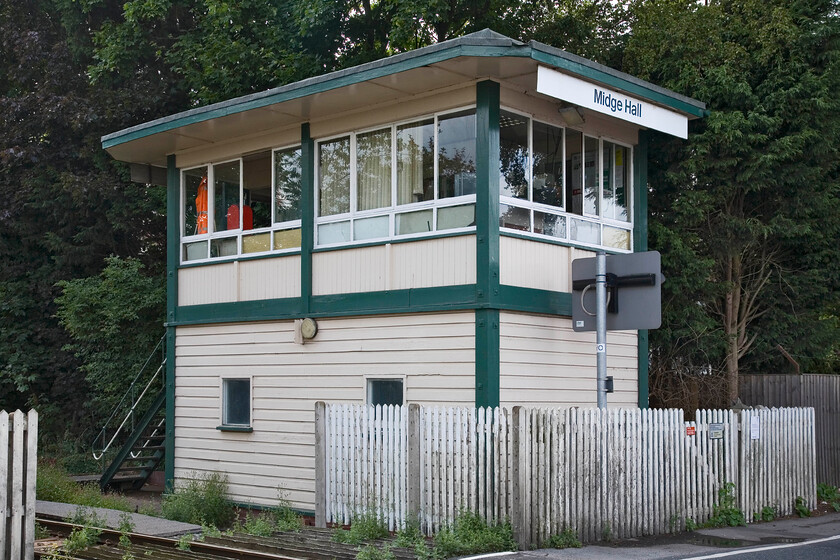 Midge Hall signal box (BR (LMR), 1972) 
 Midge Hall signal box was opened in 1972, replacing a much earlier box diagonally opposite on the platform end of the now-closed station. The box was installed as part of the WCML's re-signalling and was a fringe box from the new state-of-the-art Preston PSB. The line from Preston to Ormskirk is now largely singled with a token exchange taking place at Midge Hall. The box wears its BR corporate image nameplate. 
 Keywords: Midge Hall signal box BR LMR