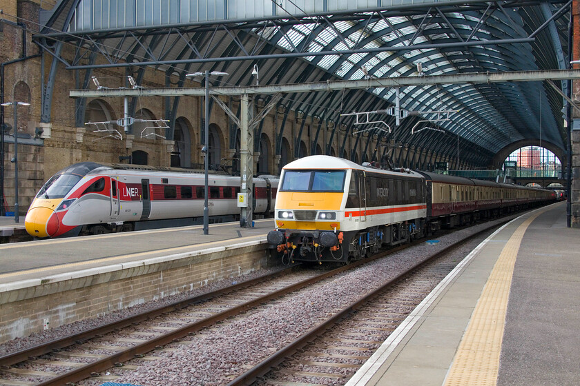 801229, GR 09.06 London King's Cross-York (1N18, 1L) & 90001, outward leg of the London to Castle Howard, Durham, Beamish & Newcastle, 08.15 London King's Cross-Newcastle (1Z90, RT), London King's Cross station 
 Old and new stand side by side at a very quiet King's Cross. To the left 801229 will work the ASLEF strike-breaking 09.06 service to York whilst to the right 90001 'Royal Scot' will lead a charter north also stopping at York but going on to Newcastle. The curiously titled London to Castle Howard, Durham, Beamish and Newcastle charter would take passengers north where they would enjoy steam haulage from York to Newcastle courtesy of 90007 'Sir Nigel Gresley' and then for it to haul the entire return journey south. Passengers could alight at York for a trip to Castle Howard or at Durham for a few hours at the Living Museum of the North at Beamish. Alternatively, they could spend some time left to their own devices in York, Durham or Newcastle. 
 Keywords: 801229 09.06 London King's Cross-York 1N18 90001 outward leg of the London to Castle Howard Durham Beamish Newcastle 08.15 London King's Cross-Newcastle 1Z90 London King's Cross station Royal Scot LNER LSL