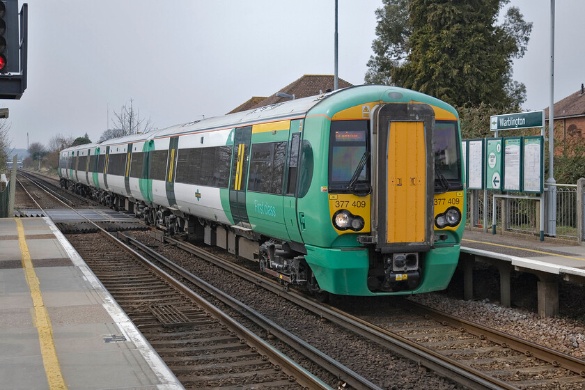 377409, SN 13.13 Southampton C-London Victoria, Warblington station 
 The 13.13 Southampton Central to Victoria train passes Warblington station. Being deep in southern territory the platforms are pre-formed concrete probably a product of there once extensive plant at Exmouth Junction just east of Exeter. 
 Keywords: 377409, SN 13.13 Southampton C-London Victoria, Warblington station.jpg