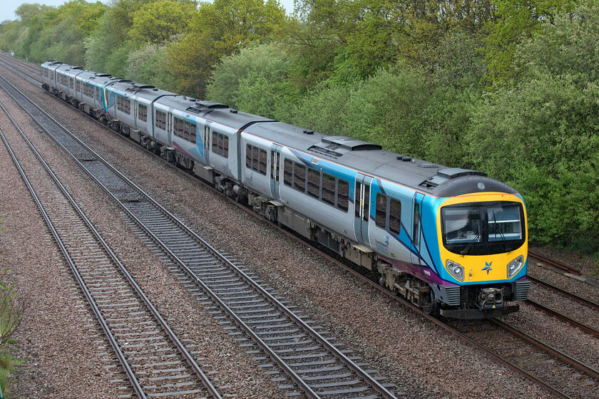 185115 & 185112, TP 14.26 Cleethorpes-Manchester Piccadilly (1B83, RT), Cuckoo bridge SE660116 
 To quote the 1981 single by Supertramp, 'it's raining again'! TPE's 185115 and 186112 are seen near Stainforth taken from a large and remote bridge adjacent to the former Hatfield colliery. The two units are working the 14.26 Cleethorpes to Manchester Piccadilly service. 
 Keywords: 185115 185112 14.26 Cleethorpes-Manchester Piccadilly 1B83 Cuckoo bridge SE660116TransPennine Express