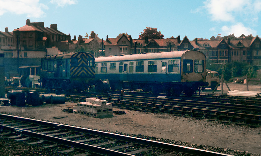 Class 08 & observation saloon, Newport station 
 On the return home my mates and I stopped at Newport. From the platform end a class 08 shunter stabled. Next to it is a converted Mk.1 carriage used as an observation saloon. 
 Keywords: Class 08 observation saloon Newport station