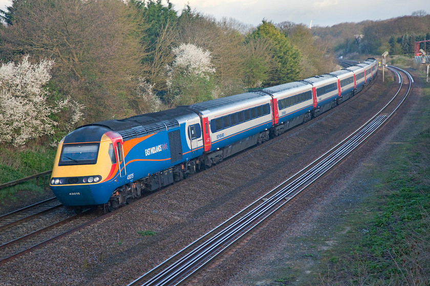 43075, 06.32 Nottingham-London St. Pancras (1B13, RT), Sharnbrook Junction Tl002598 
 The sight of an East Midlands HST brightens up a dreary morning! 43075 leads the 06.32 Nottingham to St. Pancras down Sharnbrook Bank on the approach to the junction at the bottom. 43075 was an Eastern Region power car delivered during 1978 as part of set 254010. I probably would have cursed it back in the '70s on the ECML as it was set to oust the beloved Deltics, how things change! 
 Keywords: 43075 1B13 Sharnbrook Junction Tl002598