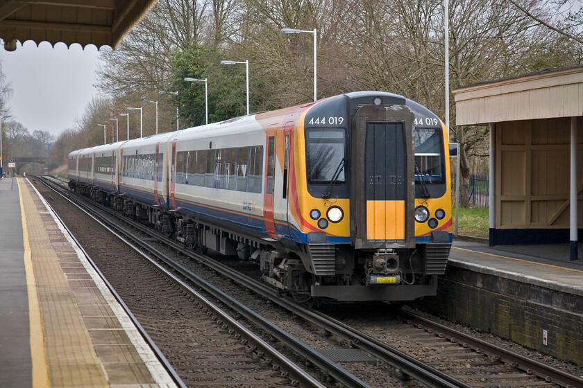 444019, SW 10.45 London Waterloo-Portsmouth & Southsea, Milford station 
 Another member of the extensive Desiro family passes Milford station at speed. 444019 is seen working the SWT's 10.45 Waterloo to Portsmouth and Southsea service. 
 Keywords: 444019 10.45 London Waterloo-Portsmouth & Southsea Milford station Desiro