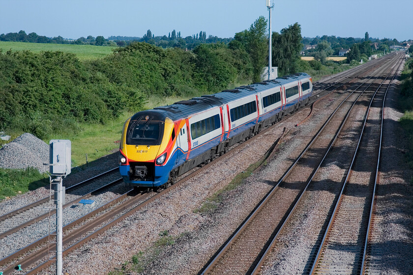 222017, EM 07.02 Nottingham-London St. Pancras (1B16), Lower Farm Road, Bromham TL028518 
 222017 passes Bromham working EMTs' 07.02 Nottingham to St. Pancras service. With work now underway to electrify the line this scene will change dramatically in the next few years. However, if the progress of the GWML is anything to go by it will be a number of years before the wires are strung! 
 Keywords: 222017 07.02 Nottingham-London St. Pancras 1B16 Lower Farm Road, Bromham TL028518 EMT East Midlands Trains Meridian