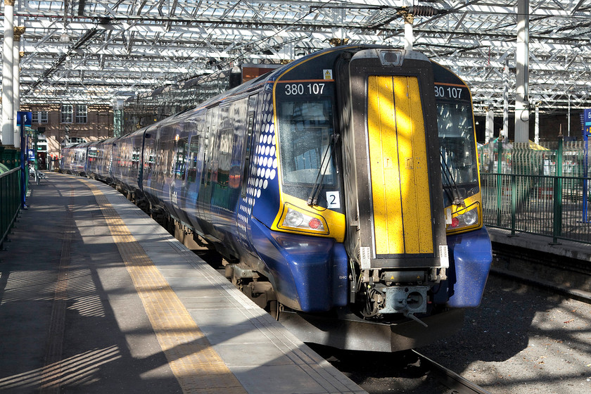 380107, SR 10.43 Edinburgh Wavereley-North Berwick (2Y10), Edinburgh Waverley station 
 There were no issues with me standing on platform four this morning following yesterday's issues, see...... https://www.ontheupfast.com/v/photos/21936chg/25778364804/x380107-18-14-edinburgh-waverley .... 380107 is stabled on the platform and will work the 10.43 to North Berwick later in the morning. I love the lighting in this image with the sun illuminating the stunning roof at the eastern end of Waverley station. 
 Keywords: 380107 10.43 Edinburgh Wavereley-North Berwick 2Y10 Edinburgh Waverley station