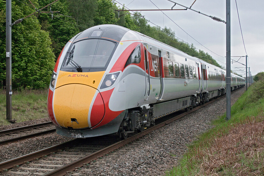 800109, GR 10.00 London King's Cross-Aberdeen (1W11, 3E), Penny's crossing SK630970 
 800109 works the 10.00 King's Cross to Aberdeen LNER train past Penny's crossing near the South Yorkshire village of Great Rossington. 
 Keywords: 800109 10.00 London King's Cross-Aberdeen 1W11 Penny's crossing SK630970 LNER Azuma