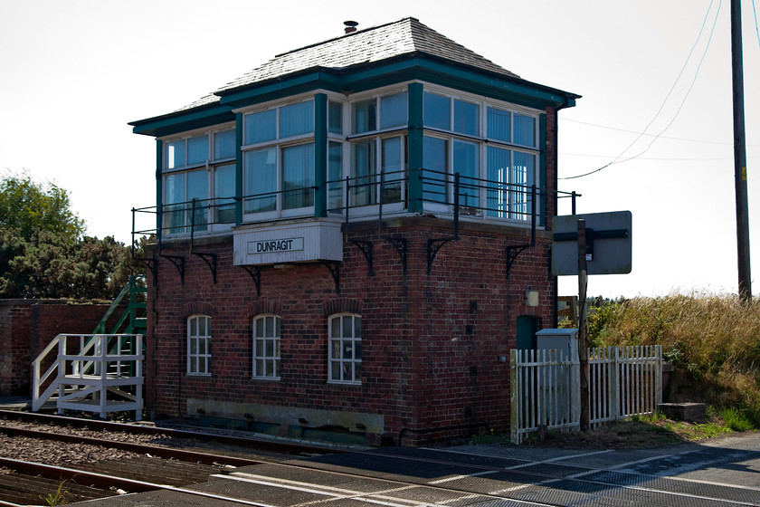 Dunragit signal box (LMS, 1927) 
 Dunragit signal box close to the shore of Luce Bay. It's an impressive LMS built box of 1927 vintage replacing an existing structure. The box is in good external condition having many of its original features, including the windows. 
 Keywords: Dunragit signal box