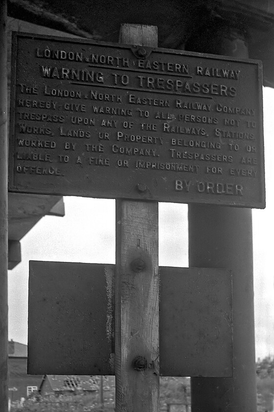 Cast sign, Goxhill station 
 One of two former LNER cast trespass notices at Goxhill station. This sign would have been installed by the second largest of the 'Big Four' sometime after its creation in 1923. It's survival into the 1980s was amazing enough but on a subsequent visit to Goxhill in 2007 I found the same sign still present; a quite extraordinary survivor! 
 Keywords: Cast sign Goxhill station LNER cast sign