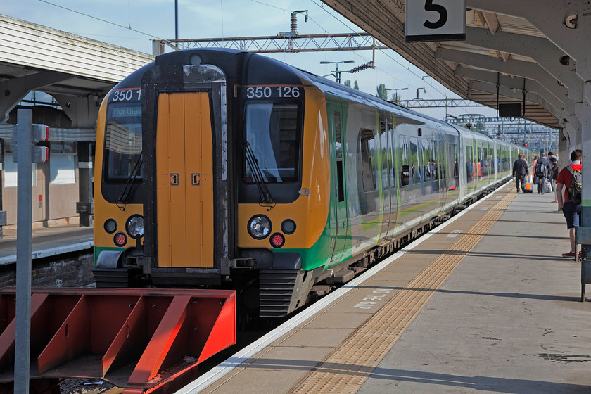 350126 & 350103, 08.16 Northampton-Birmingham New Street (2Y63), Northampton station 
 350126 and 350103 wait at Northampton's platform five to work the 08.16 to Birmingham New Street. I took this train as far as Rugby as the first leg of my journey to Crewe. 
 Keywords: 350126 350103 08.16 Northampton-Birmingham New Street 2Y63 Northampton station