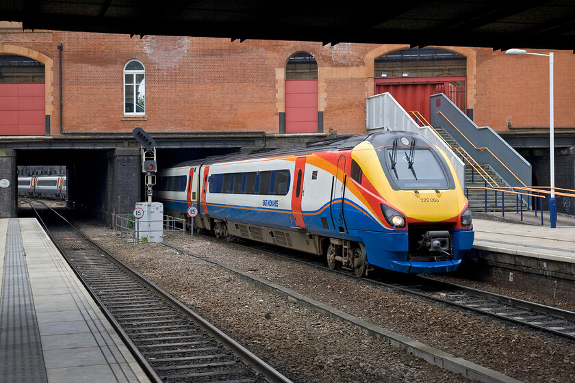 222006, EM 13.58 London St. Pancras-Sheffield (1F40), Leicester station 
 The brick structure that spans the lines and the ends of the platforms seen in this photograph is all that remains of the Leicester (London Road) station structure that was opened in 1894 for the Midland Railway having been designed by Charles Trubshaw. The rest of the buildings were wiped away in 1978 when the station underwent its third re-build giving us what we have today. 222006 arrives at the station working the 13.58 London St. Pancras to Sheffield 1F40 service. 
 Keywords: 222006 13.58 London St. Pancras-Sheffield 1F40 Leicester station EMT East Midlands Trains Meridian