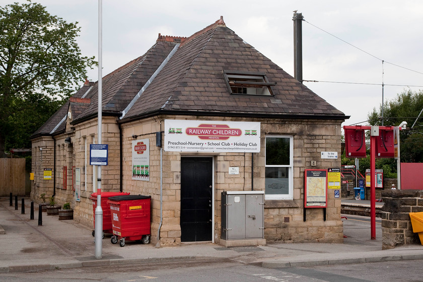 Frontage, Menston station 
 Like so many station buildings, they have either been sold off or are leased to private users. In this case, the 1865 Midland built station building at Menston is now used for child care. It's nice to see that their logo includes a totem and that it even in the correct colour for the location of the station! 
 Keywords: Frontage Menston station