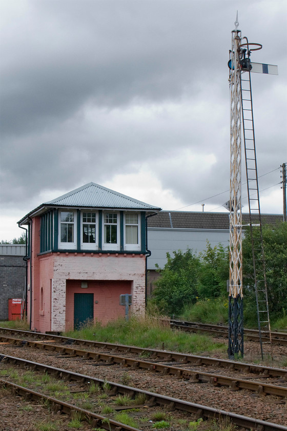 Fort William Junction (ex. Mallaig Junction) signal box (NB,1849) & latticed signal post 
 A superb example of a Caledonian Railway latticed signal at Fort William Junction. This one is controlled by the adjacent signal box of the same name (formally Mallaig Junction and prior to that Banavie Junction) that is seen sitting in the vee between the Mallaig and Glasgow lines. 
 Keywords: Fort William Junction Mallaig Junction signal box NB 1849 latticed signal post North British Banavie Junction