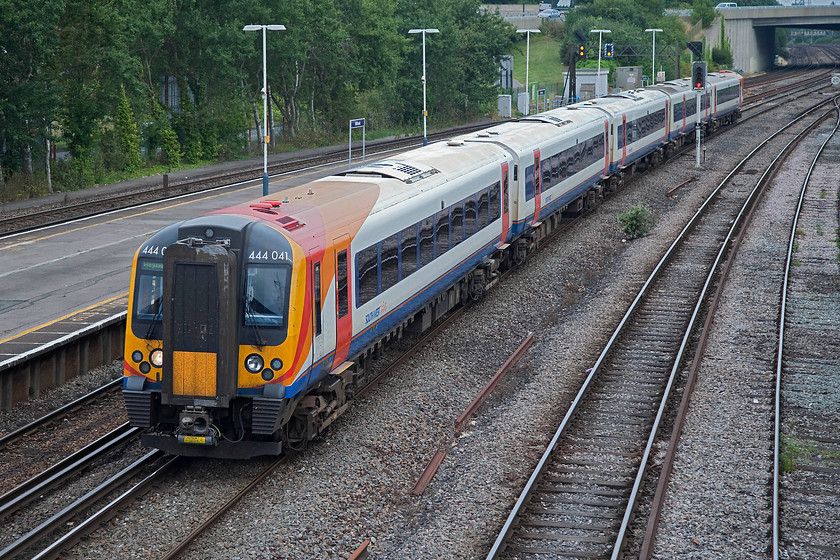 444041, SW 15.05 London Waterloo-Weymouth (1W71, 2L), Millbrook station 
 The footbridge that crosses the lines at Millbrook station affords superb views in both directions. Here, 444041 forms the 15.05 Waterloo to Weymouth service that has just left Southampton station some mile of so east from here. 
 Keywords: 444041 1W71 Millbrook station