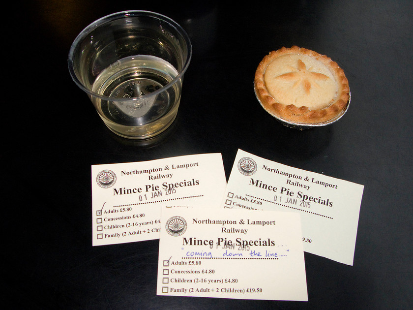 Tickets, sherry & mince pies 
 The New Year's Day sherry and mince pie trains run up and down the line from Pitsford and Brampton station. Passengers can stay on the train for multiple trips but will only be served with one glass of sherry in a plastic cup and shop bought mince pie! I do think that the railway could make a little more of the tickets, these hand-cut paper affairs are not what visitors to a heritage railway should come to expect. 
 Keywords: Tickets sherry mince pies