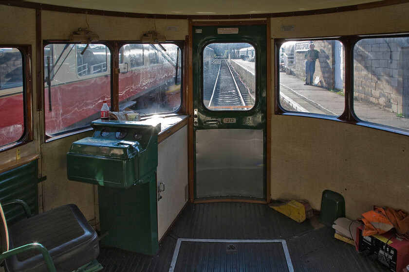 1212, cab view, Wansford station 
 If you thought that the view from the front seats of a British Railways first-generation DMU was impressive, take a look at this! This is the sight that passengers would enjoy from the interior of a Swedish Railways Y7 railcar. 1212 was built in 1958 continuing in service until the early 1980s. This end is relatively clear but, at the other end, the engine takes up considerable room with it being unable to be underslung due to the railcar sitting so low to the track. 
 Keywords: 1212 cab view Wansford station Helga