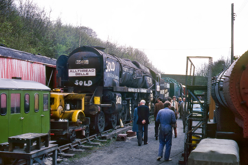 35018, awaiting restoration, Ropley Yard 
 35018 'British India Line' had arrived in the yard at Ropley only a month prior to this photograph being taken having been rescued from Dai Woodham's famous Barry scrapyard. It came to the Mid-Hants Railway with the tender from 35025 'Brocklebank Line'. It would take another incredible thirty-six years before it would steam again in 2016, with it moving between various locations, with the work eventually being completed at Carnforth's Steamtown by WCR. 35018 is now mainline registered and undertakes charter work but it is one steam locomotive that I have yet to capture undertaking such work.

UPDATE - UPDATE - UPDATE..... I now have my first photograph of this locomotive since this one was taken in 1980. Some forty-four years later it is seen on the mainline passing through Roade, see..... https://www.ontheupfast.com/p/21936chg/30055442424/x35018-11-26-carnforth-steamtown 
 Keywords: 35018 awaiting restoration Ropley Yard British India Line Watercress Line Mid Hants Railway