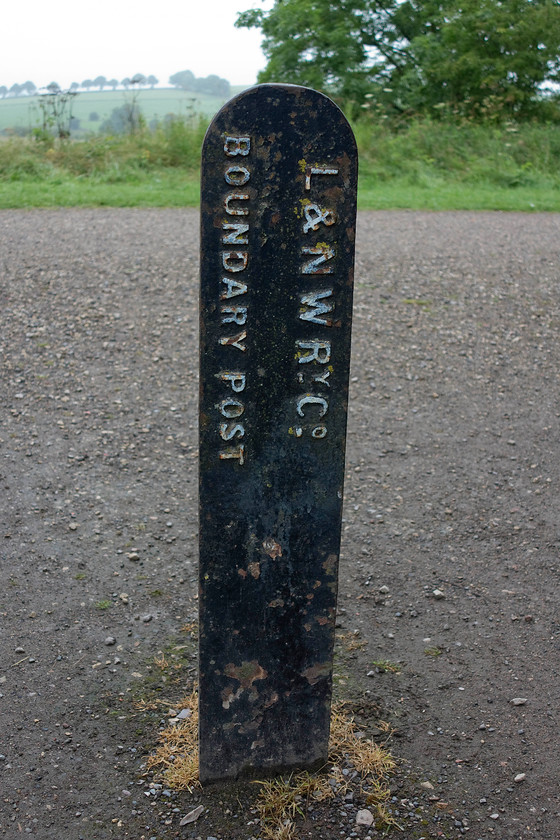 LNWR boundary post, site of Hartington station 
 A former LNWR boundary post located at the site of Hartington station that was closed on 7th October 1963. 
 Keywords: LNWR boundary post, site of Hartington station