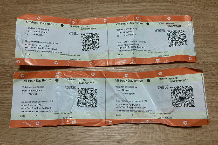 Tickets, Sheringham-Norwich-Sheringham 
 Our return tickets from Sheringham to Norwich were bought from a table set up at Norwich station just in front of the barriers. With no ticket inspections taking place on trains due to COVID working practices we should have bought our tickets at the newly installed machine at Sheringham station. I have to admit that we both walked straight past it only noticing it on our return! With our two-together discount loaded, it worked out at a very reasonable 12. Looking at these paper tickets it is clear that they are not as durable as the card types that appear to be becoming increasingly rare now with the scanning of QR codes replacing the physical passing of tickets through a gate machine. 
 Keywords: Tickets Sheringham-Norwich-Sheringham