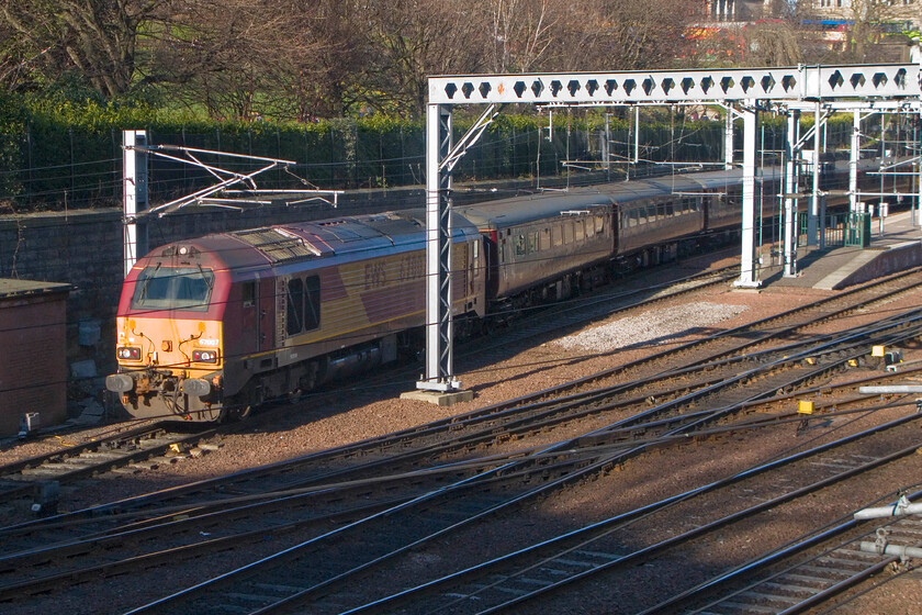 67007, SR 17.08 Edinburgh Waverley-Edinburgh Waverley (2G13), leaving Edinburgh Waverley from The Mound Station 
 As per yesterday afternoon, see....https://www.ontheupfast.com/p/21936chg/30051098286/x67007-16-08-edinburgh-waverley-edinburgh 67007 leaves Edinburgh Waverley station leading the Fife Circle evening commuter service. The 2G13 is an all-station stopper service that leaves at 17.08 and is composed of a rake of Mk.IID air-conditioned stock that should be a step up for passengers more usually used to a meagre unit! 
 Keywords: 67007 17.08 Edinburgh Waverley-Edinburgh Waverley 2G13 leaving Edinburgh Waverley from The Mound Station EWS