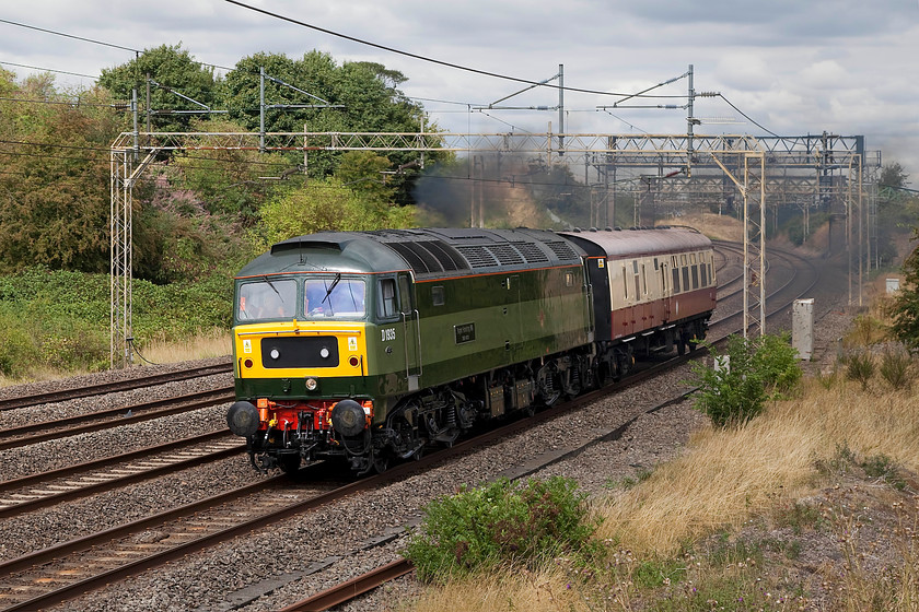 D1935 (47805), 09.30 Crewe HS-Southall (0Z47), Old Linslade 
 Andy and I had been watching this 0Z47 working making its way towards us on RTT and were not at all sure what it was actually going to be as there had been no internet gen updates. When this super green D1935 'Roger Hosking MA 1925-2013' came around the corner with a single mark I coach we were mighty pleased! Even more so as it then proceeded to open up and produce a bit of clag to add to the occasion! The working was the 09.30 Crewe to Souhall. 
 Keywords: D1935 47805 09.30 Crewe HS-Southall 0Z47 Old Linslade