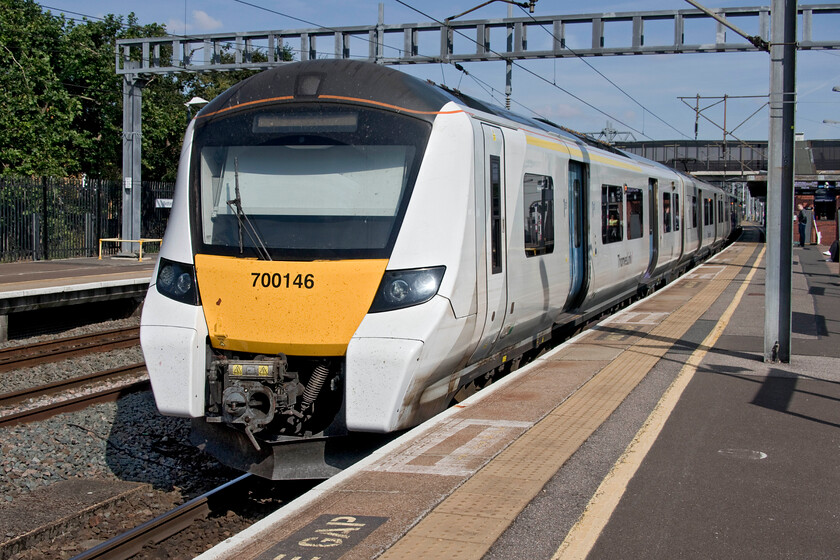 700146, TL 10.05 Bedford-Gatwick Airport (9R17, 4L), Bedford station 
 Thameslink's 700146 prepares to leave Bedford with the 10.05 service to Gatwick Airport. With sunblind pulled down quite so far I am amazed that the driver has any forward vision from his seat in the leading cab! 
 Keywords: 700146 10.05 Bedford-Gatwick Airport 9R17 Bedford station Thameslink