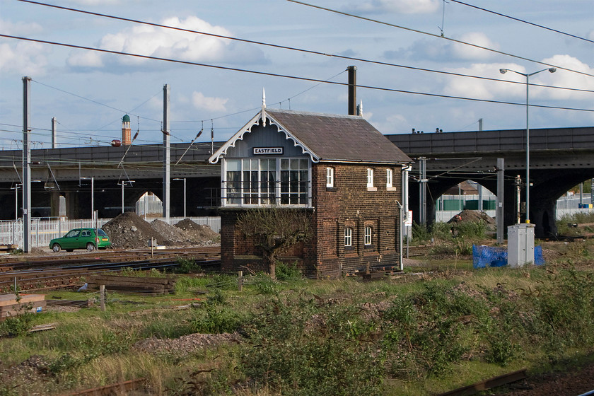 Eastfield signal box (GN, 1893) 
 A remarkable survivor just north of Peterborough station is Eastfield signal box. It controls ths sidings to the east of the ECML and access to the GBRF depot through a number of semaphores signals. In this view, the rear of the 1893 Great Eastern box is seen that keeps many of its original features including some very tall finials and ornate bargeboards. 
 Keywords: Eastfield signal box