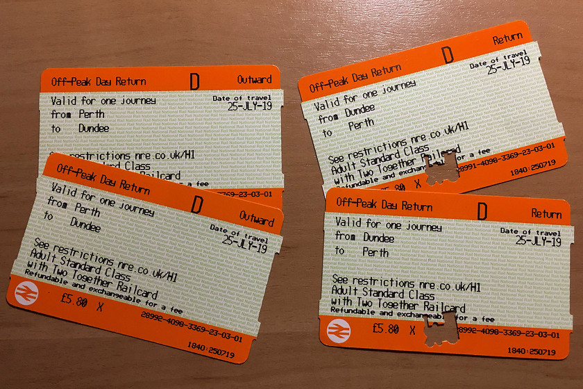 Tickets, Perth-Dundee-Perth 
 Andy and I have a two-together card so fares are one-third cheaper. Just over 11 as an off-peak walk on return from Perth to Dundee seemed about right, especially as we enjoyed an HST in both directions! Notice the amusing and highly appropriate way that the ticket has been clipped! 
 Keywords: Tickets Perth-Dundee-Perth