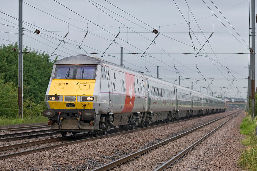 82211, GN 05.25 Newcastle-London King`s Cross (1Y05), Holme Green crossing TL192426 
 Wearing its relatively recently applied Virgin branding, DVT 82211 leads the 05.25 Newcastle Central to King's Cross. The 1Y05 service is seen passing one of my favourite spots on the ECML at Holme Green just south of Biggleswade. 
 Keywords: 82211 05.25 Newcastle-London King`s Cross 1Y05 Holme Green crossing TL192426