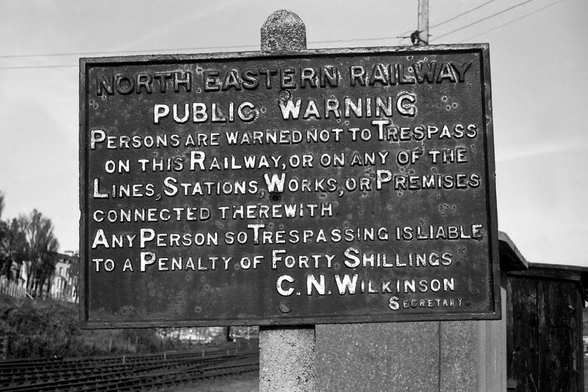 NER cast sign, Bog Hall 
 There was, and still is for that matter, a foot crossing over the railway just south-west of Whitby station at the delightfully named Bog Hall, or Boghall in local parlance. The crossing now leads over to a vast car park and riverside frontage with many pleasure boats moored up. However, this cast sign of North Eastern Railway heritage is long gone with just a standard red and white do not trespass on the railway notice installed. I really hope that when the sign was removed it was not merely skipped and broken up with a hammer rather that it lives on today in somebody's back garden. 
 Keywords: NER cast sign Bog Hall