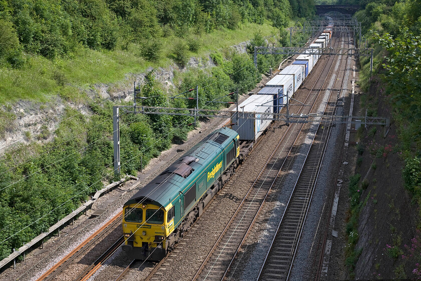 66503, 10.14 Felixstowe North-Lawley Street (4M20), Roade cutting 
 66503 was named 'The Railway Magazine' back in 2004 when it was just five years old. It is seen doing what it was designed to do, namely hauling a heavy Freightliner service, in this case, the 4M20 10.14 Felixstowe to Lawley Street. The train is seen making its way through Roade cutting. 
 Keywords: 66503 10.14 Felixstowe North-Lawley Street (4M20), Roade cutting Freightliner The Railway Magazine