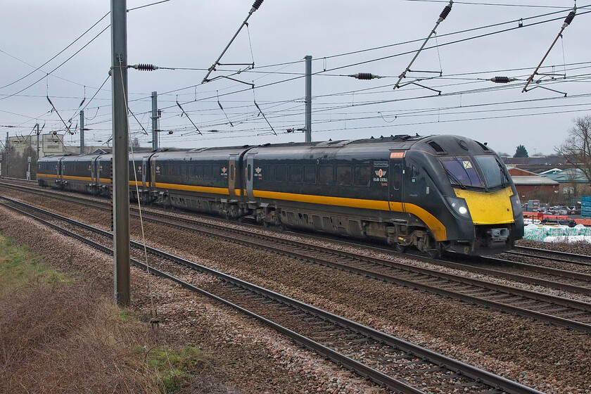 180108, GC 07.51 London King's Cross-Eaglescliffe (1N90, RT), Sandy TL176510 
 Compared with other trains on the ECML the ageing Class 180 Adelantes are beginning to look a little out of place! They are the ultimate in hand-me-downs having been all over the country in the hands of various operators since their introduction some twenty-three years ago. 180108 William Shakespeare heads north past Sandys New Zealand bridge working Grand Centrals 07.51 Kings Cross to Eaglescliffe service. I am not sure as to why this service was terminating at Eaglescliffe on this day, perhaps engineering works precluded it from working any further north with the dreaded bustitution in place for the hapless passengers aboard! 
 Keywords: 180108 07.51 London King's Cross-Eaglescliffe 1N90 Sandy TL176510 Grand central