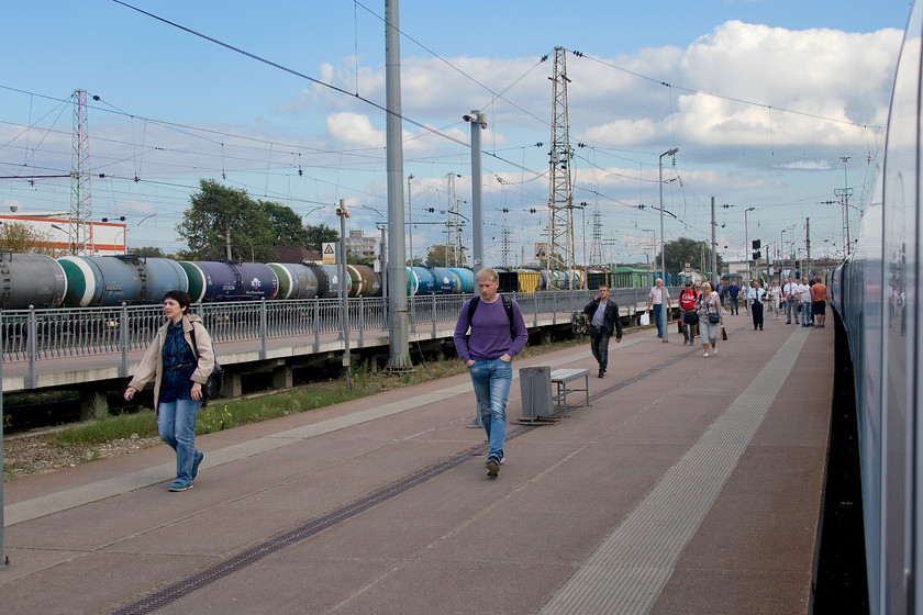 EVS01-12, 13.00 St. Petersburg-Moscow (765A), Tver station 
 Our train, the 13.00 St. Petersburg to Moscow pauses at Tver station. The on-board automated announcer stated quite clearly stated that the train would only be stoping for sixty seconds and that passengers must not leave the train unless departing at this this station, a message probably aimed at the many of Russia's smokers! Tver is a town of some 450, 000 thousand people about a hundred miles north-east of Moscow. It has a large wagon and carriage works as well as being a meeting point for a number of primary lines. 
 Keywords: EVS01-12 13.00 St. Petersburg-Moscow 765A Tver station