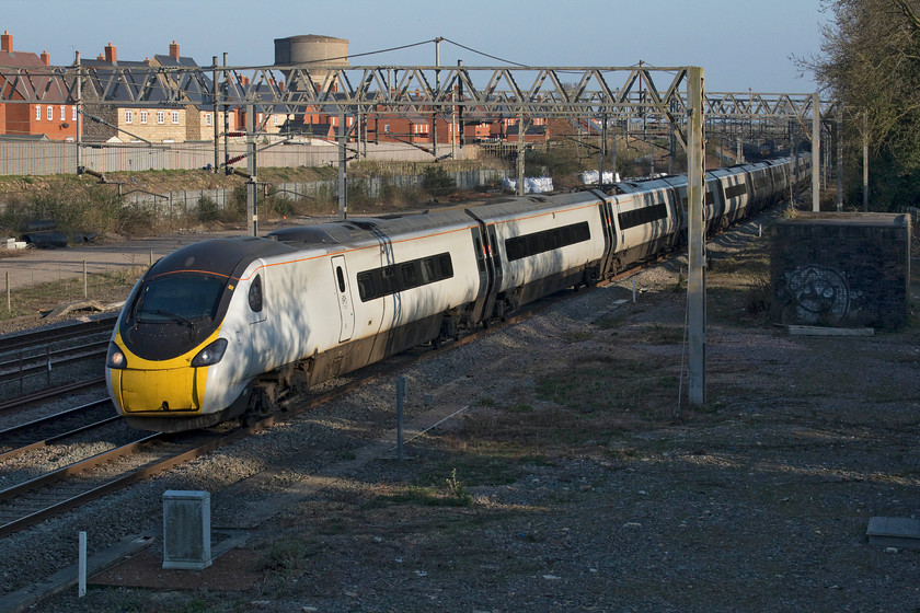 390117, VT 16.03 London Euston-Liverpool Lime Street (1F20, 12L), site of Roade station 
 Last year Network Rail kindly cleared away all the trees in this location opening up new photographic opportunities of this view in Roade at the site of the old station. 390117 'Blue Peter' works the 16.03 Euston to Liverpool Lime Street considerably faster than the preceding train a short time before and which would soon be slowing up the Class 390 no doubt, see..... https://www.ontheupfast.com/p/21936chg/28942159604/x86614-86604-11-13-felixstowe-north 
 Keywords: 390117 16.03 London Euston-Liverpool Lime Street 1F20 site of Roade station Avanti West Coast Pendolino Blue Peter