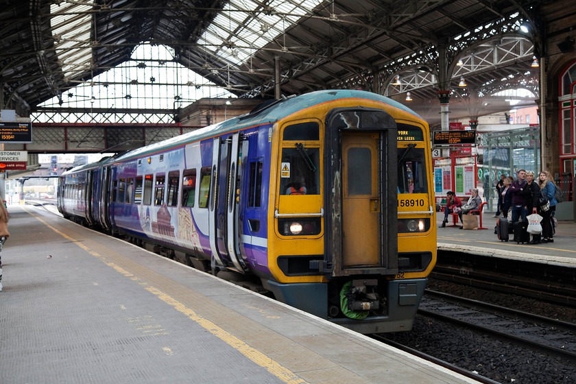 158910, NT 15.37 Preston-York (1B27, 4L), Preston Station 
 158910 leaves Preston station with the 1B27 15.37 to York. The class 158s were built by BREL Derby in the early 1990s. However, despite their lightweight aluminium construction they were fraught with early problems. It took some years of operation for their problems to be ironed-out and they have now settled down and have become pretty dependable and found all over the network. 
 Keywords: 158910 1B27 Preston Station