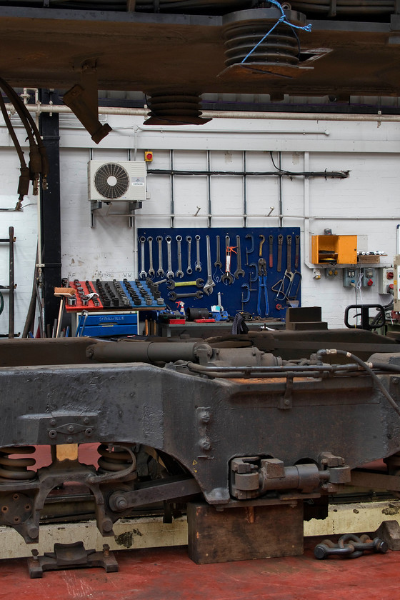 14. 66426, bogie & underframe, DRS open-day, Kingmoor 
 I work in a garage where we have many tools on racking as seen here, if everybody does their job and returns them after use! However, it is not so obvious in this shot but the size of these spanners, wrenches and sockets used by DRS at their Kingmoor facility somewhat dwarf the ones we use! This view is seen through a gap where 66426 has been lifted from its bogies that can be seen below themselves having had their wheel sets removed for attention. 
 Keywords: 66426 bogie underframe DRS open-day Kingmoor