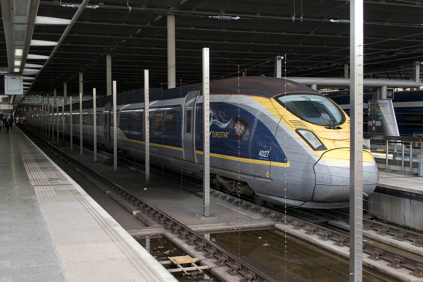 374027, ES 14.31 London St. Pancras-Paris Gare du Nord (9O32), London St. Pancras station 
 They say that beauty is in the eye of the beholder but I can't help feeling that the Class 374 e320s are a rather ugly and bulbous design; others will undoubtedly disagree with me! I think that the design of the original Class 373s (now largely scrapped or in storage) is a far more meaty and purposeful look? With that this in mind, 374027 waits at St. Pancras prior to passengers boarding that will later work the 14.31 service to Paris Gare du Nord whisking passengers along at up to two hundred miles per hour. 
 Keywords: 374027 14.31 London St. Pancras-Paris Gare Du Nord 9O32 London St. Pancras station Eurostar