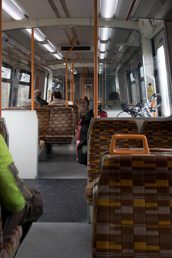 Interior, 315811, LO 12.55 Chingford-London Liverpool Street (2T63, RT), Bethnal Green station 
 When the class 315s entered service in 1980/1 I am sure that the interiors were seen to be very modern and up-to-date. In my opinion, nearly forty years on, they still don't look too bad being light, airy and having comfortable seats covered in a traditional moquette. They have had a number of overhauls with the latest being as recent as 2015 but this has not been enough to save them. This carriage of set 315811, along with all the others, will soon be going to the scrap man and confined to railway history. 
 Keywords: Interior 315811 12.55 Chingford-London Liverpool Street 2T63 Bethnal Green station