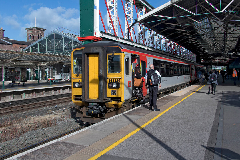 153329 & 153914, NT 08.10 Chester-Liverpool Lime Street (1B04, 1L), Chester station 
 My morning train from Chester to Helsby stands at Chester amidst the busiest scene so far seen this morning! I travelled on 1B04 08.10 service to Liverpool Lime Street worked by 153329 and 153914. This is one of the regular TfW services that traverse the Halton Curve from Frodsham Junction to Halton Junction enabling it to access the WCML just south of Runcorn. Until these services commenced in 2014 there was only a summer weekday parliamentary train with closure looking likely. 
 Keywords: 153329 153914 08.10 Chester-Liverpool Lime Street 1B04 Chester station