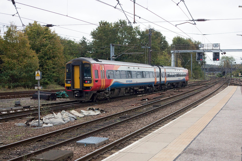 158806, EM 14.57 Norwich-Liverpool Lime Street (1R98, 33L), Norwich station 
 I quite like these class 158 units (and their 159 cousins) but I am not sure that I would want to do a journey right across the country from Liverpool to Norwich in one? 158806 leaves Norwich with the 14.57 to Lime Street. Something obviously went wrong at some point during its journey as it arrived 33 minutes late into Liverpool. 
 Keywords: 158806 14.57 Norwich-Liverpool Lime Street 1R98 Norwich station