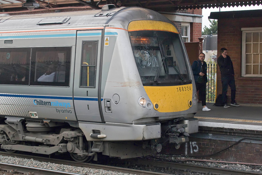 Broken windscreen, 168324, CH 14.55 Birmingham Moor Street-London Marylebone (1H53, 23L), Leamington Spa station 
 It is clear from the mess on the front of 168324 that some large and unfortunate creature has met its death but in doing so inflicted some considerable damage to the front of the cab with a badly broken secondman's windscreen. The 14.55 Moor Street to Marylebone service was running almost to time as far as Hatton where it suddenly lost a lot of minutes. I suspect that after the incident, the driver inspected the damage, contacted control and then proceeded at a reduced speed to London where it arrived nearly half an hour late. Unfortunately for the passengers, it was absolutely packed due to the closure of the WCML with Chiltern accepting Virgin and London Northwestern tickets from Birmingham. 
 Keywords: Broken windscreen 168324 14.55 Birmingham Moor Street-London Marylebone 1H53Leamington Spa station