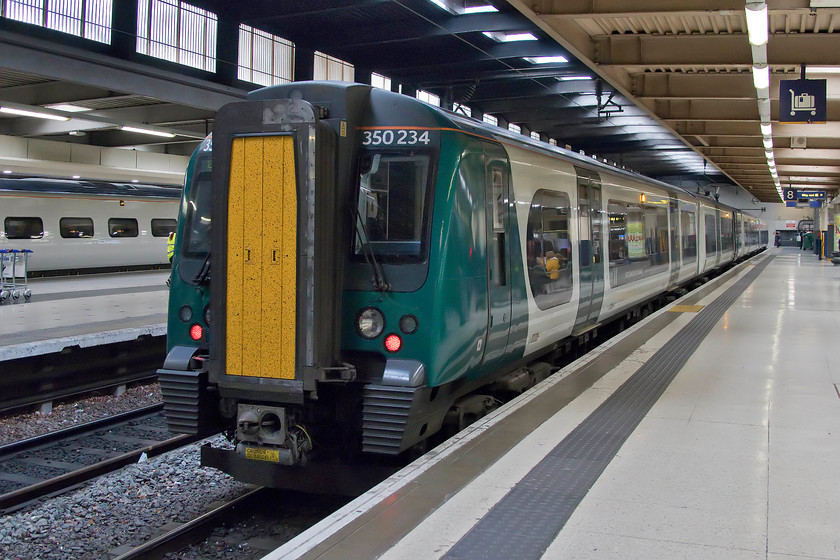 350234, LN 09.05 Northampton-London Euston (2T00, RT), London Euston station 
 Having alighted from the 09.05 Northampton to Euston at London I turned my camera to the rear of 350234 as it stands on platform eight. This was not the train I was supposed to travel on, it was, in fact, a peak service. However, due to terrible disruption at Coventry, there was no guarantee that my off-peak train would have arrived in Northampton, so restrictions were lifted. 
 Keywords: 350234 09.05 Northampton-London Euston 2T00 London Euston station