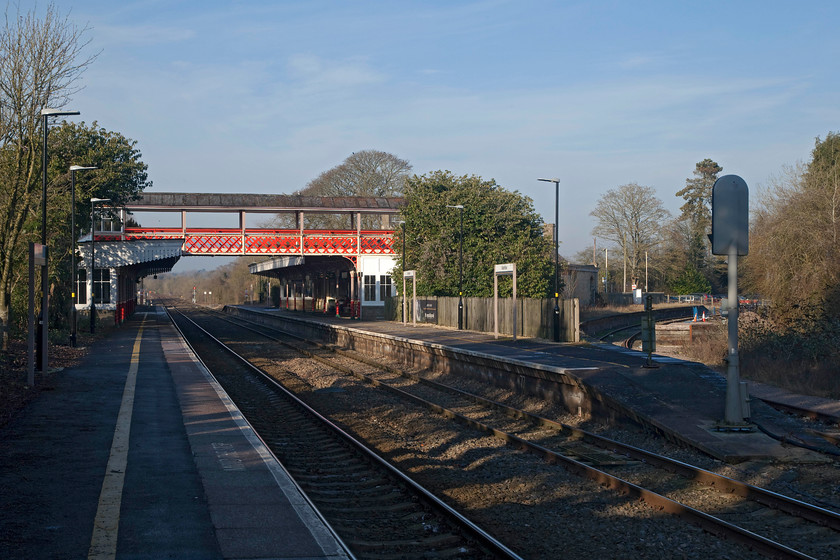 Kemble station 
 The afternoon of our day out turned out to be a loverly winter one with clear and crisp light. On our journey home we called in at Kemble station. The station, built in 1845, has had a varied history. In the 1960s and 1970s things looked grim when it lost its branches to Cirencester and Tetbury following by BR singling the line from here to Swindon. However, its on the up now as the line has been re-doubled and passenger numbers are healthy for such a rural location. Judging by the huge and overflowing car park most travellers appeared to be commuters. 
 Keywords: Kemble station