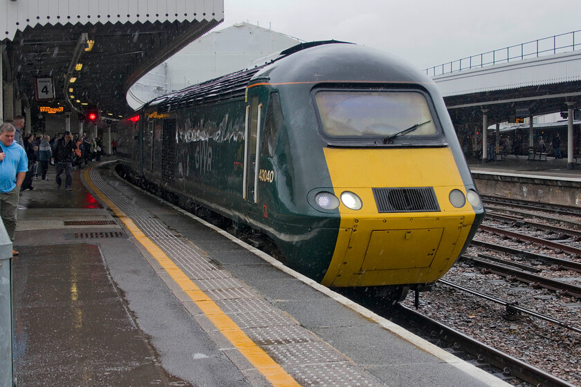 43040, GW 12.00 Cardiff Central-Taunton (2C75, RT), Bristol Temple Meads station 
 In torrential rain that even made such a seemingly straightforward photograph tricky to take Castle Class (Class 255) 43040 'Berry Pomeroy Castle' waits at Bristol Temple Meads to continue with the 12.00 Cardiff to Taunton service. Andy and I took this train to Weston-super-Mare enjoying the smart and surprisingly refined interior. Running as 2C75 it stopped at every station excluding Weston Milton. 
 Keywords: 43040 12.00 Cardiff Central-Taunton 2C75 Bristol Temple Meads station Great Western Castle HST Berry Pomeroy Castle