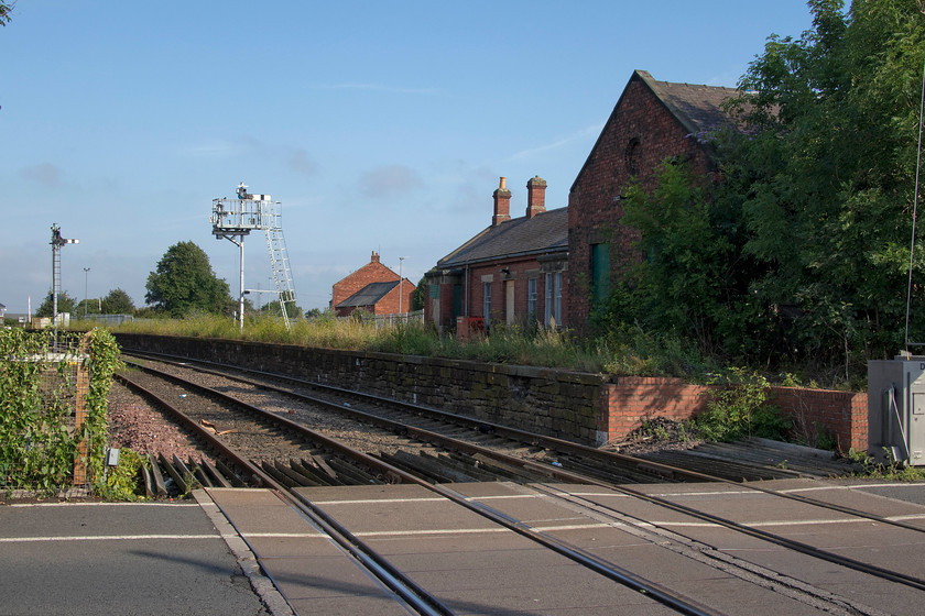 Former Bedlington station 
 Taken from the level crossing just adjacent to Bedlington South signal box is the old station that was closed on 02.11.64. It was unusual in that it only had one platform that served trains in both directions thus meaning some complicated cross-over moves by down trains. There are active and continuing discussions about the re-opening of this station and a number of others in this relatively poorly rail connected part of the the north east. 
 Keywords: Former Bedlington station