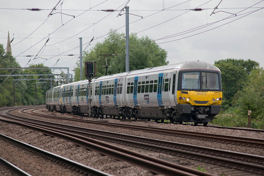 365519 & 365525, GN 08.22 London Kings Cross-Peterborough (1P44, RT), Gills Crossing 
 Great Northern's 365519 and 365525 head north on the down slow line past Offord Cluny between St. Neots and Huntingdon. These reliable units now have a limited time left on this line, or any line for that matter as their future is far from assured. The best case scenario is that they enter storage until a new operator is found; too good to scrap surely? 
 Keywords: 365519 365525 1P44 Gills Crossing