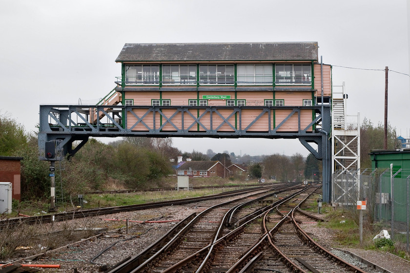 Canterbury West Signal Box (SR, 1928) 
 The incredible and very impressive Canterbury West signal box is seen astride the lines to the east of the station. The overhead box was built by the Southern Railway in 1928 but I am unsure as to why it was constructed in this manner; advise anybody, please? Despite being out of use now the box is Grade II listed so its future, for the moment at least, seems secure. 
 Keywords: Canterbury West Signal Box 1928 Southern Railway